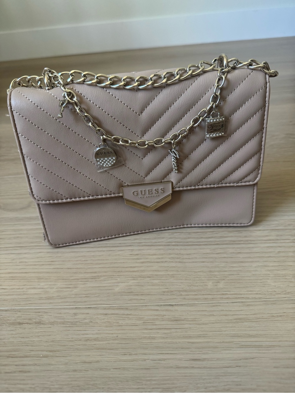 GUESS Quilted Crossbody Bag in Blush Pink with Gold Chain